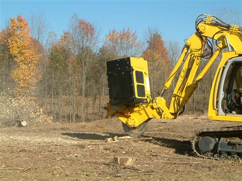 mini excavator pulling stumps|stump removal machine.